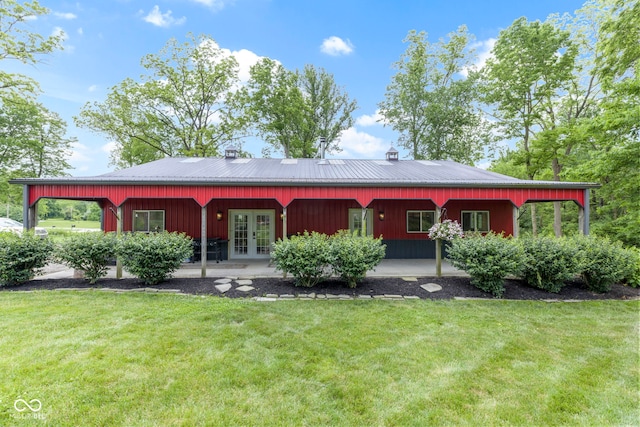 17320 Joliet Rd, Westfield, IN 46074 - back of property featuring french doors, a yard, and a metal roof