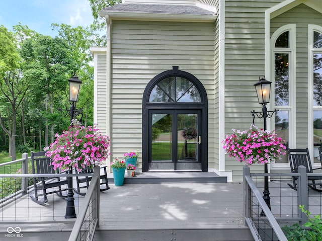 17320 Joliet Rd, Westfield, IN 46074 - view of exterior entry featuring roof with shingles and a deck