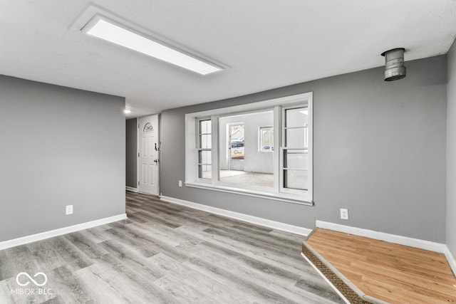 3529 Hunt St, Plainfield, IN 46168 - empty room with wood finished floors and baseboards