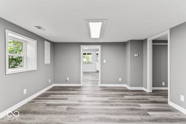 3529 Hunt St, Plainfield, IN 46168 - basement featuring wood finished floors and a textured ceiling