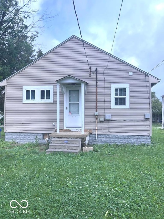 4715 Normal Ave, Indianapolis, IN 46226 - back of house featuring a yard