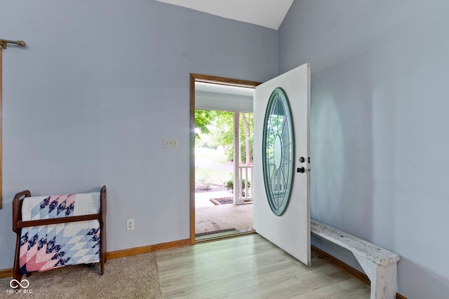 10808 Greenbriar Dr, Fishers, IN 46037 - foyer entrance with baseboards and wood finished floors