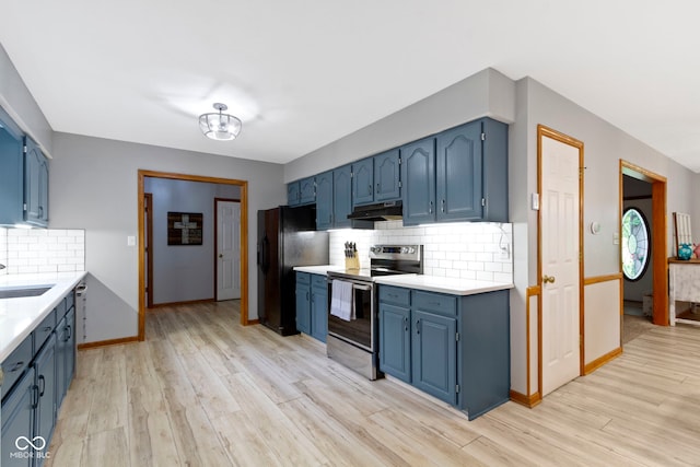 10808 Greenbriar Dr, Fishers, IN 46037 - kitchen featuring stainless steel electric stove, blue cabinets, under cabinet range hood, black fridge, and light countertops