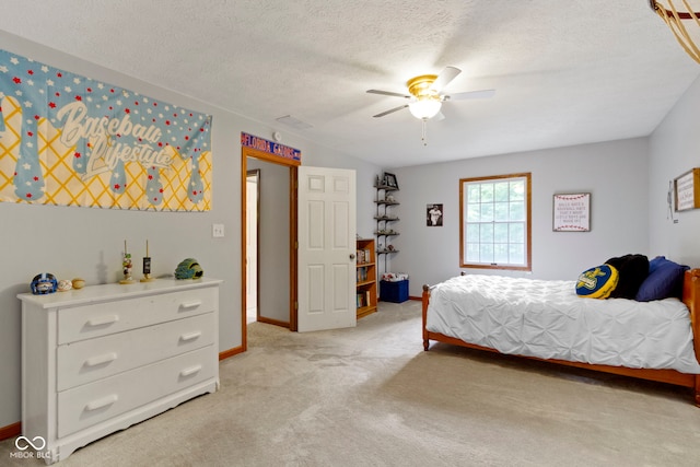 10808 Greenbriar Dr, Fishers, IN 46037 - bedroom with light carpet, a textured ceiling, and a ceiling fan