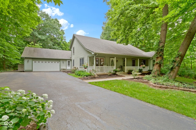 10808 Greenbriar Dr, Fishers, IN 46037 - view of front of property featuring a porch, asphalt driveway, and a garage