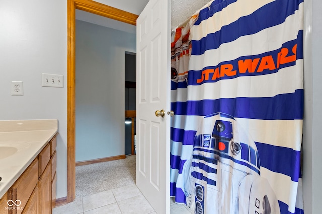 10808 Greenbriar Dr, Fishers, IN 46037 - bathroom featuring tile patterned flooring, vanity, and a shower with curtain