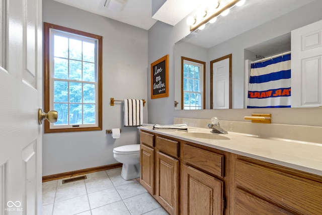 10808 Greenbriar Dr, Fishers, IN 46037 - full bathroom featuring vanity, plenty of natural light, tile patterned flooring, and curtained shower