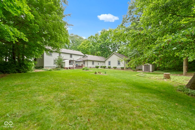 10808 Greenbriar Dr, Fishers, IN 46037 - view of green lawn featuring a storage shed