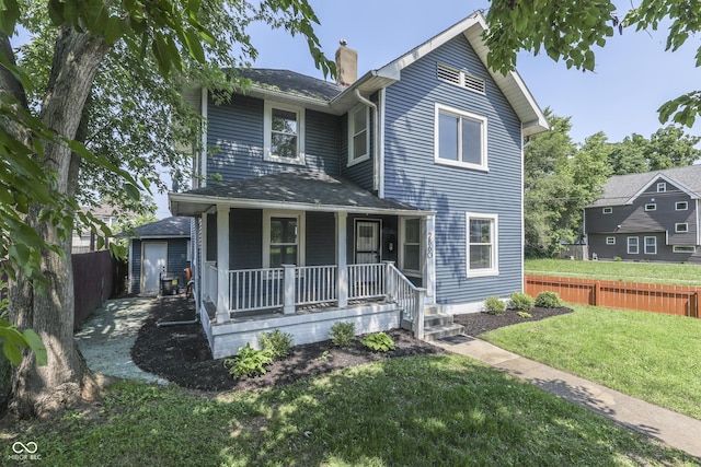 2860 Winthrop Ave, Indianapolis, IN 46205 - traditional home with covered porch and a chimney