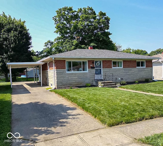 5609 Meadowood Dr, Indianapolis, IN 46224 - single story home with stone siding, concrete driveway, a carport, and a front lawn