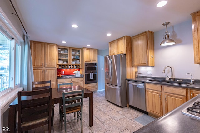 5609 Meadowood Dr, Indianapolis, IN 46224 - kitchen featuring stainless steel appliances, dark countertops, plenty of natural light, recessed lighting, and decorative light fixtures
