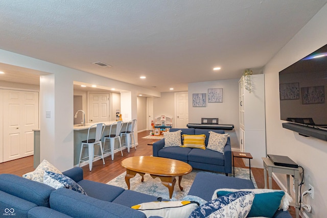 5609 Meadowood Dr, Indianapolis, IN 46224 - living room featuring recessed lighting and wood finished floors