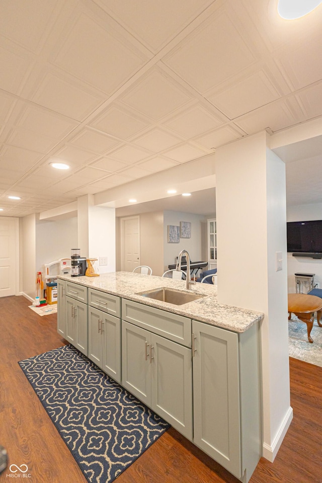 5609 Meadowood Dr, Indianapolis, IN 46224 - kitchen featuring gray cabinets, dark wood-type flooring, recessed lighting, and light stone countertops