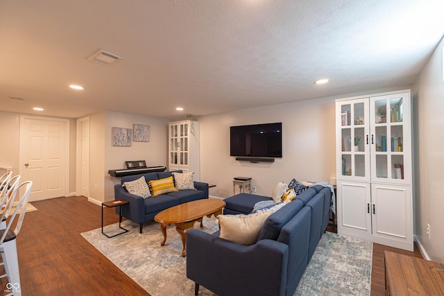 5609 Meadowood Dr, Indianapolis, IN 46224 - living area with dark wood-style flooring and recessed lighting