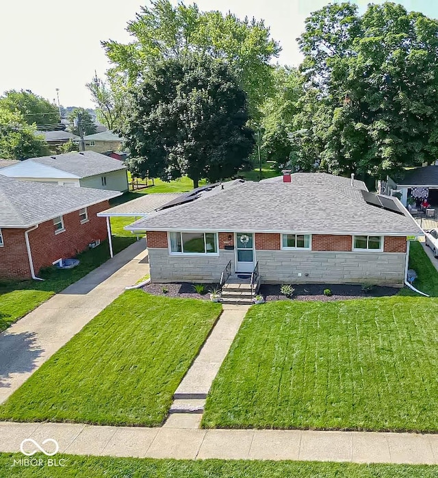 5609 Meadowood Dr, Indianapolis, IN 46224 - view of front facade featuring stone siding, a front yard, and roof with shingles
