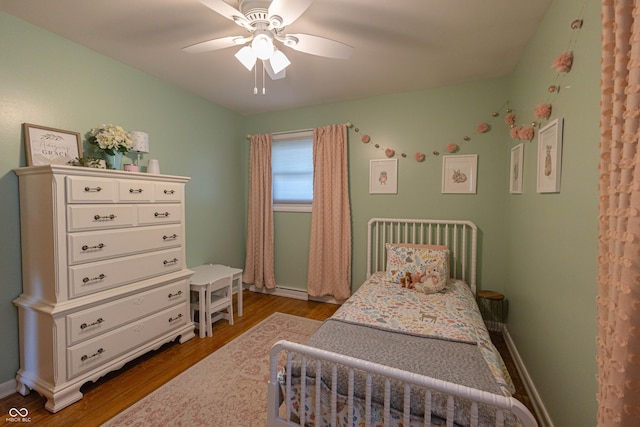 5609 Meadowood Dr, Indianapolis, IN 46224 - bedroom with wood finished floors and ceiling fan