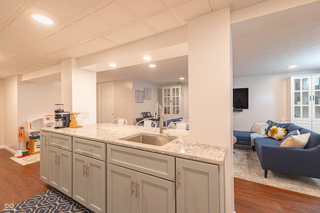 5609 Meadowood Dr, Indianapolis, IN 46224 - kitchen with dark wood-style flooring, open floor plan, light stone counters, and recessed lighting
