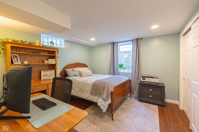5609 Meadowood Dr, Indianapolis, IN 46224 - bedroom featuring wood finished floors, recessed lighting, and an office area
