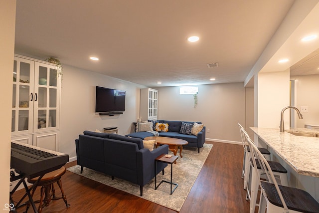 5609 Meadowood Dr, Indianapolis, IN 46224 - living area with dark wood-style floors and recessed lighting