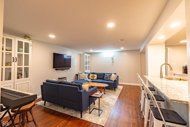 5609 Meadowood Dr, Indianapolis, IN 46224 - living room with dark wood-type flooring and recessed lighting
