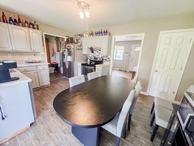 3613 N Locust St, Muncie, IN 47304 - dining area featuring light wood-style flooring