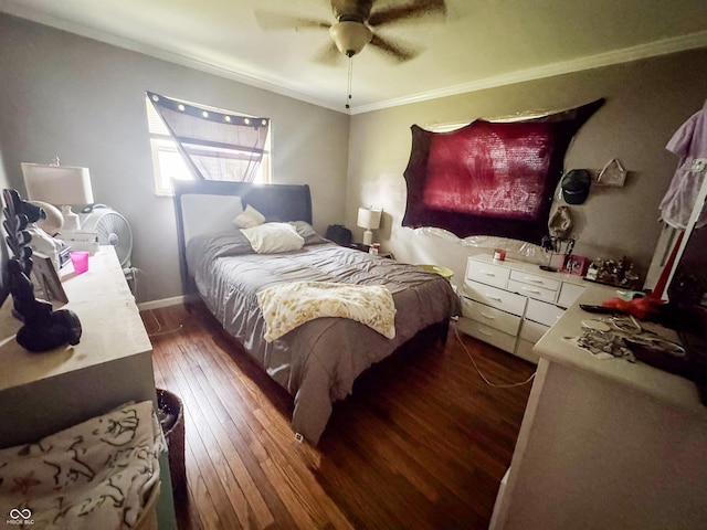 3613 N Locust St, Muncie, IN 47304 - bedroom featuring dark wood-style flooring, ornamental molding, and a ceiling fan