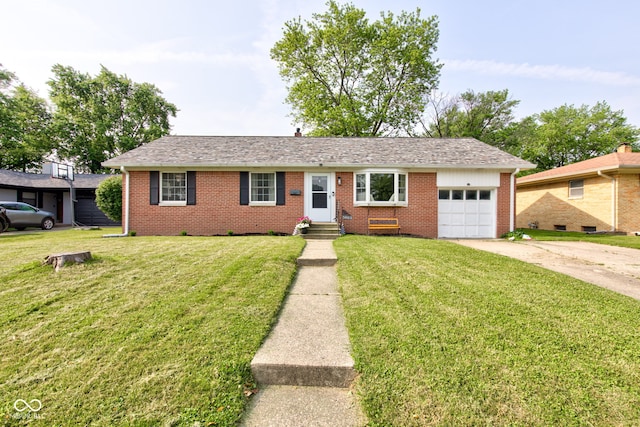 5923 W 29th Pl, Indianapolis, IN 46224 - ranch-style house featuring a garage, concrete driveway, brick siding, and a front lawn