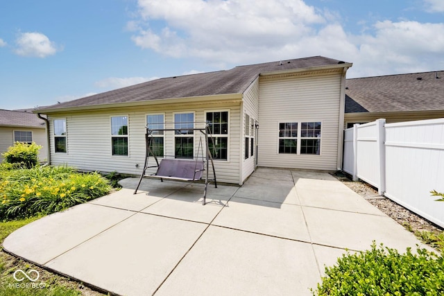 10668 Whippoorwill Ln, Indianapolis, IN 46231 - back of property featuring a patio area