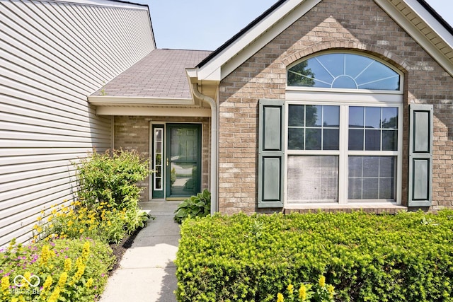 10668 Whippoorwill Ln, Indianapolis, IN 46231 - view of exterior entry with brick siding