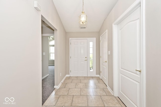 10668 Whippoorwill Ln, Indianapolis, IN 46231 - entrance foyer featuring baseboards and light tile patterned floors