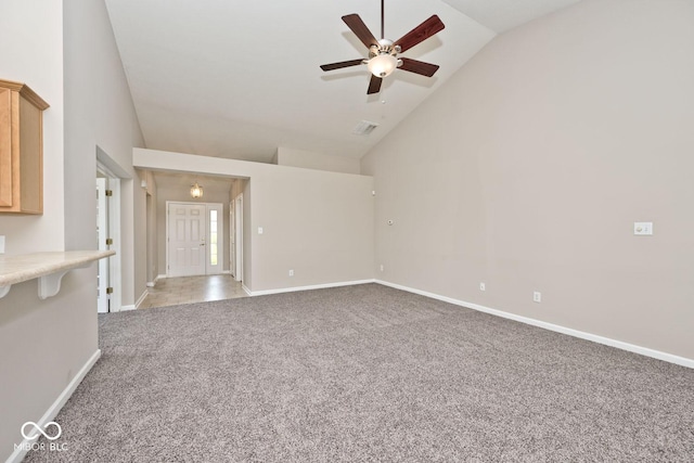 10668 Whippoorwill Ln, Indianapolis, IN 46231 - unfurnished living room featuring carpet flooring, ceiling fan, and high vaulted ceiling