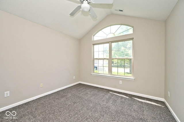 10668 Whippoorwill Ln, Indianapolis, IN 46231 - spare room with a ceiling fan, carpet flooring, and vaulted ceiling
