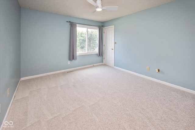 14492 Cotswold Ln, Carmel, IN 46033 - carpeted spare room with ceiling fan and baseboards