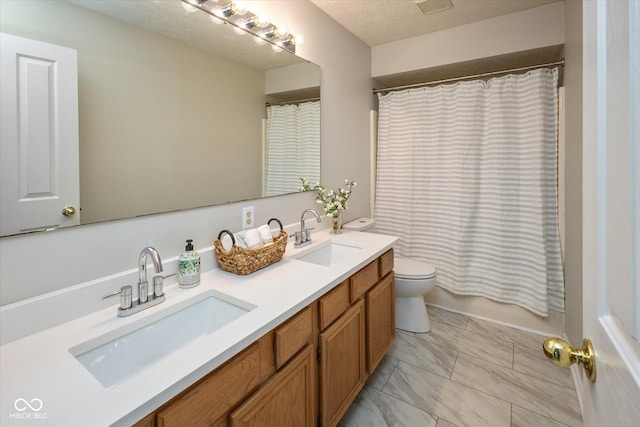 14492 Cotswold Ln, Carmel, IN 46033 - bathroom with double vanity and marble look tile flooring