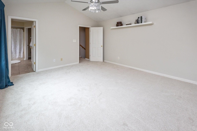 14492 Cotswold Ln, Carmel, IN 46033 - unfurnished bedroom featuring carpet, vaulted ceiling, a ceiling fan, and ensuite bathroom