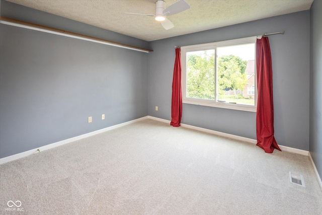 14492 Cotswold Ln, Carmel, IN 46033 - carpeted spare room with ceiling fan and a textured ceiling