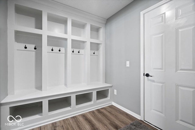 4420 Wild Turkey Dr, Indianapolis, IN 46239 - mudroom featuring baseboards and dark wood-style flooring