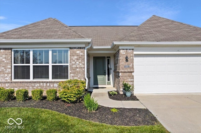 4420 Wild Turkey Dr, Indianapolis, IN 46239 - ranch-style home with roof with shingles, concrete driveway, and brick siding