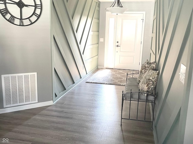 4420 Wild Turkey Dr, Indianapolis, IN 46239 - foyer entrance featuring dark wood-style flooring and baseboards
