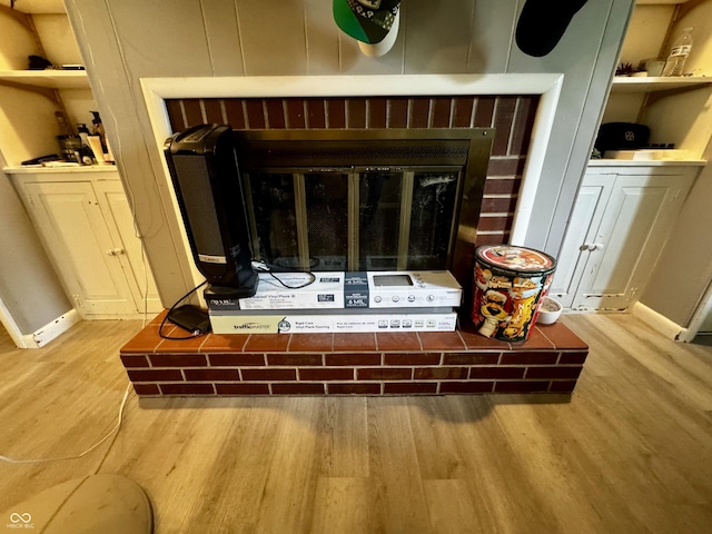 306 Waynetown Rd, Crawfordsville, IN 47933 - detailed view of wood finished floors and a glass covered fireplace
