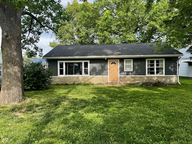 306 Waynetown Rd, Crawfordsville, IN 47933 - view of front of property featuring a front lawn and a shingled roof