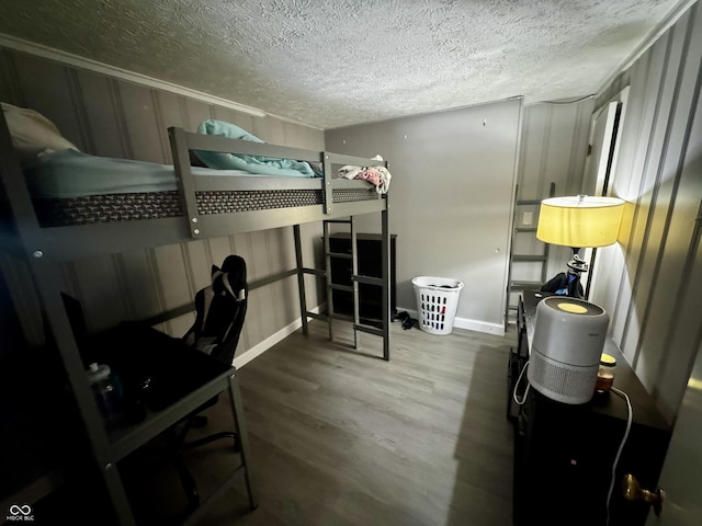 306 Waynetown Rd, Crawfordsville, IN 47933 - bedroom featuring a textured ceiling and wood finished floors