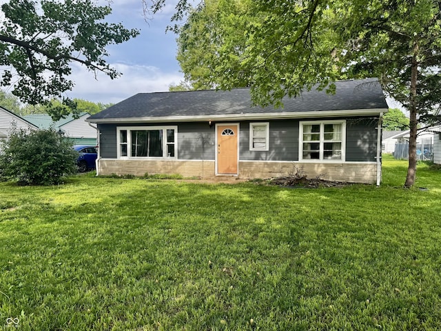 306 Waynetown Rd, Crawfordsville, IN 47933 - view of front of house with a front lawn and a shingled roof
