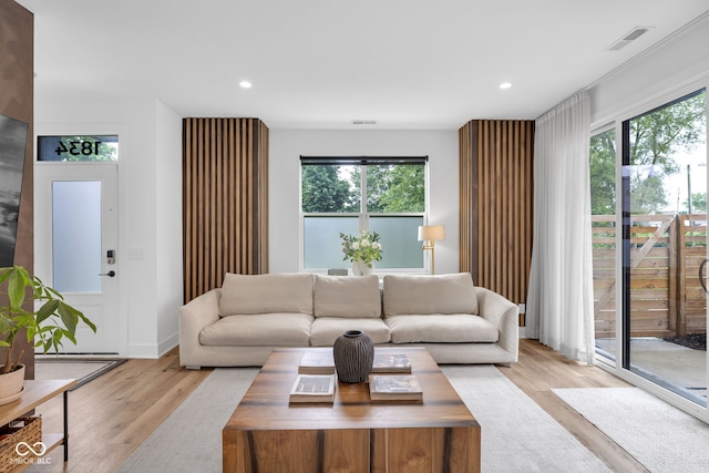 1834 Rosette Way, Indianapolis, IN 46202 - living area featuring healthy amount of natural light, light wood-style floors, and recessed lighting