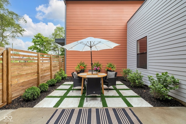 1834 Rosette Way, Indianapolis, IN 46202 - fenced backyard featuring a patio area and outdoor dining space