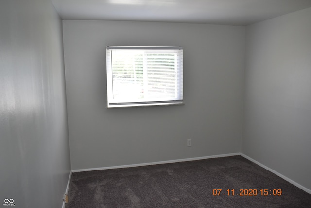 9016 Neptune Dr, Indianapolis, IN 46229 - empty room featuring dark colored carpet