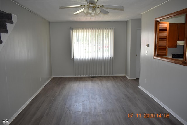 9016 Neptune Dr, Indianapolis, IN 46229 - empty room with a ceiling fan, wood finished floors, and stairway