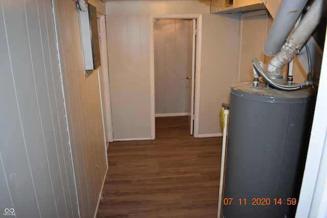 9016 Neptune Dr, Indianapolis, IN 46229 - laundry area with water heater and wood finished floors