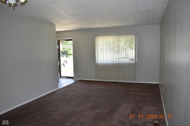 9016 Neptune Dr, Indianapolis, IN 46229 - spare room featuring carpet flooring and baseboards