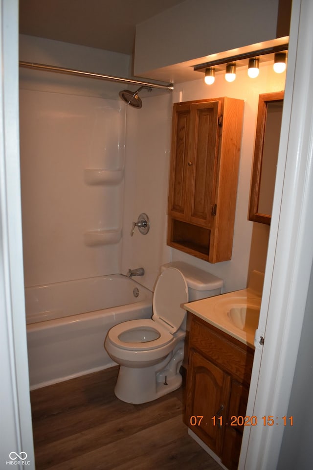 9016 Neptune Dr, Indianapolis, IN 46229 - full bathroom with vanity, bathing tub / shower combination, and wood finished floors